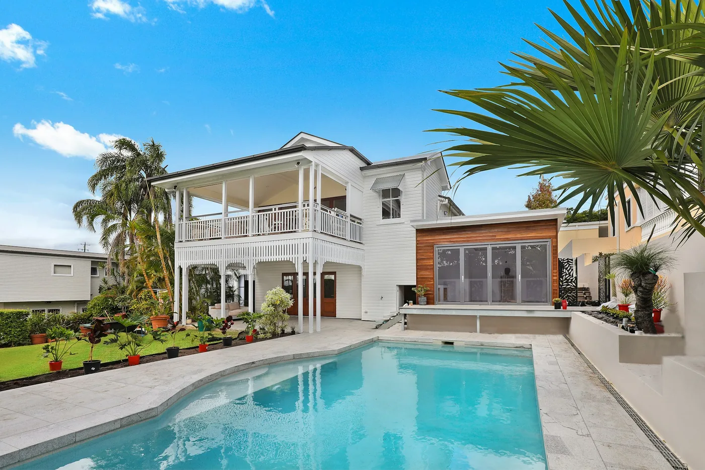 Luxury Florida residence with a swimming pool and tropical palms